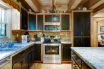 ELECTRIC STOVE & CUSTOM CABINETRY